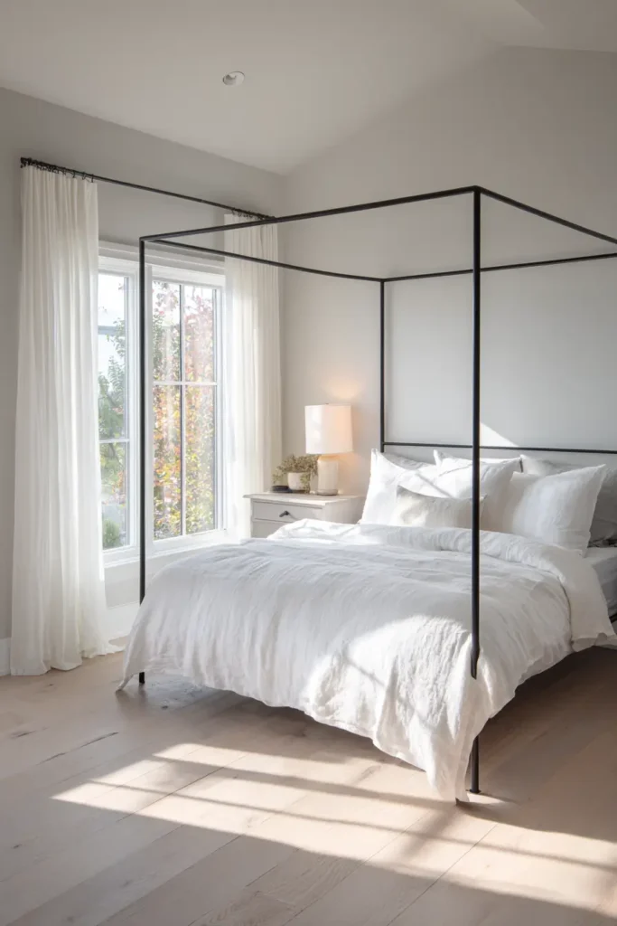 4. Black Bed Frames Against Light Walls
